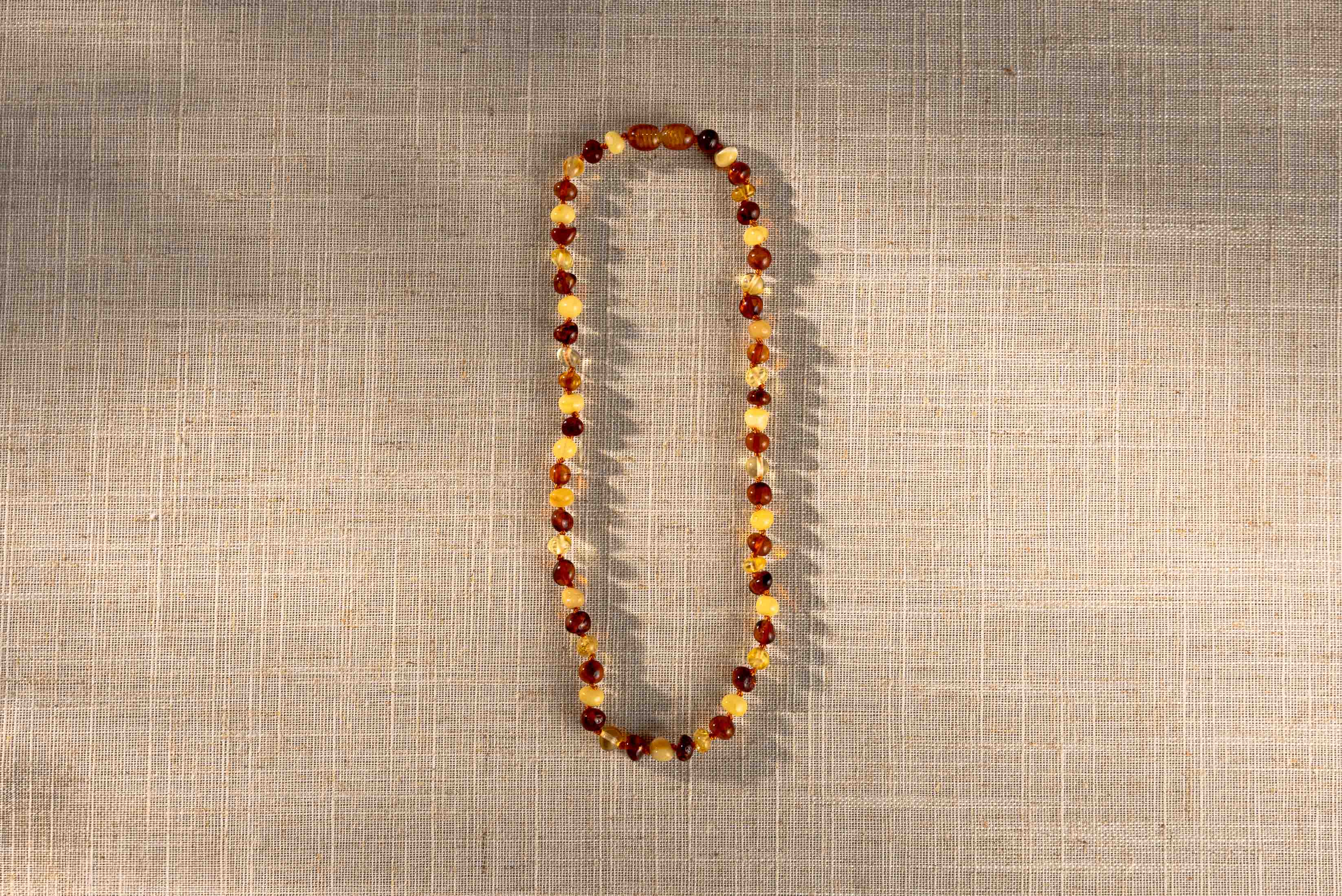 Kids Amber Necklace β Butter and Cognac Color Beads