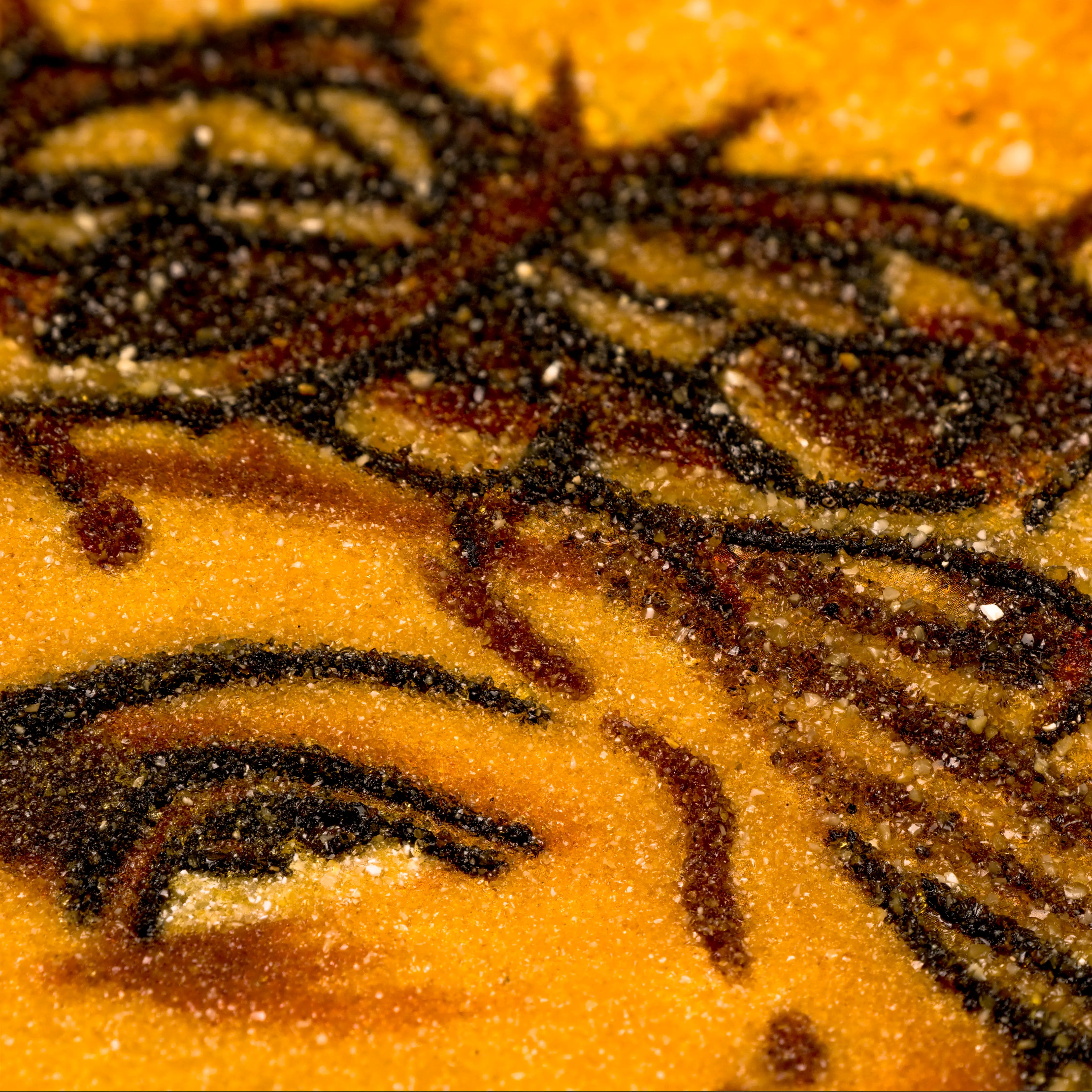 Close-up of BalticBliss genuine amber artwork featuring Jesus Christ’s crown of thorns and expressive eye, handcrafted from natural Baltic amber stones, highlighting intricate Lithuanian amber artistry and fine textured details.